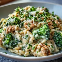 Creamy Garlic Turkey & Broccoli Orzo steams with fresh broccoli florets in a cheesy, garlicky sauce.